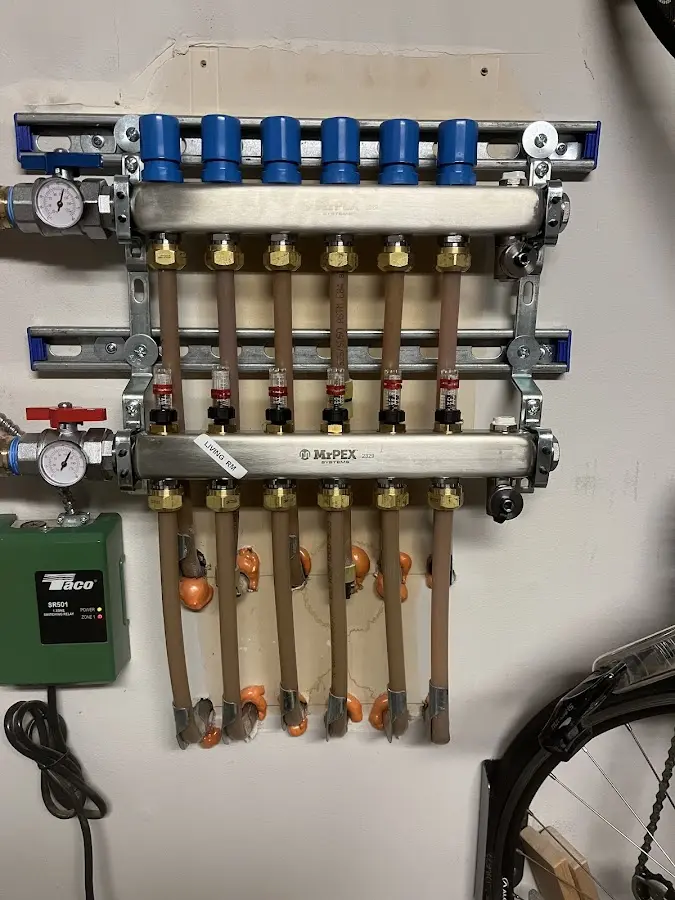 Plumber performing Gas Leak Detection at a residential property in Pittsfield